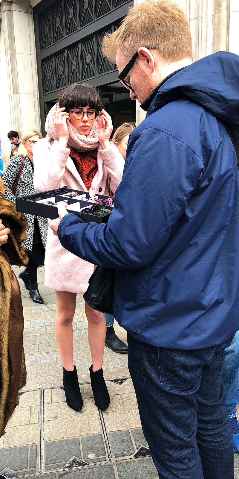 Female model trying on Catch London frames at Boots 2019 photo shoot